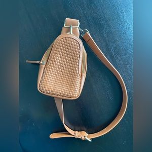 Woven liberty sling bag.